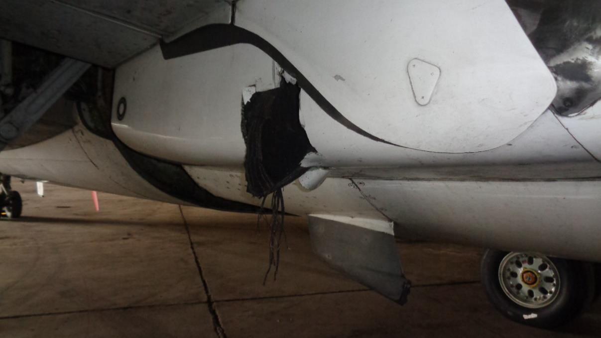 5N-SYS Fuselage damage