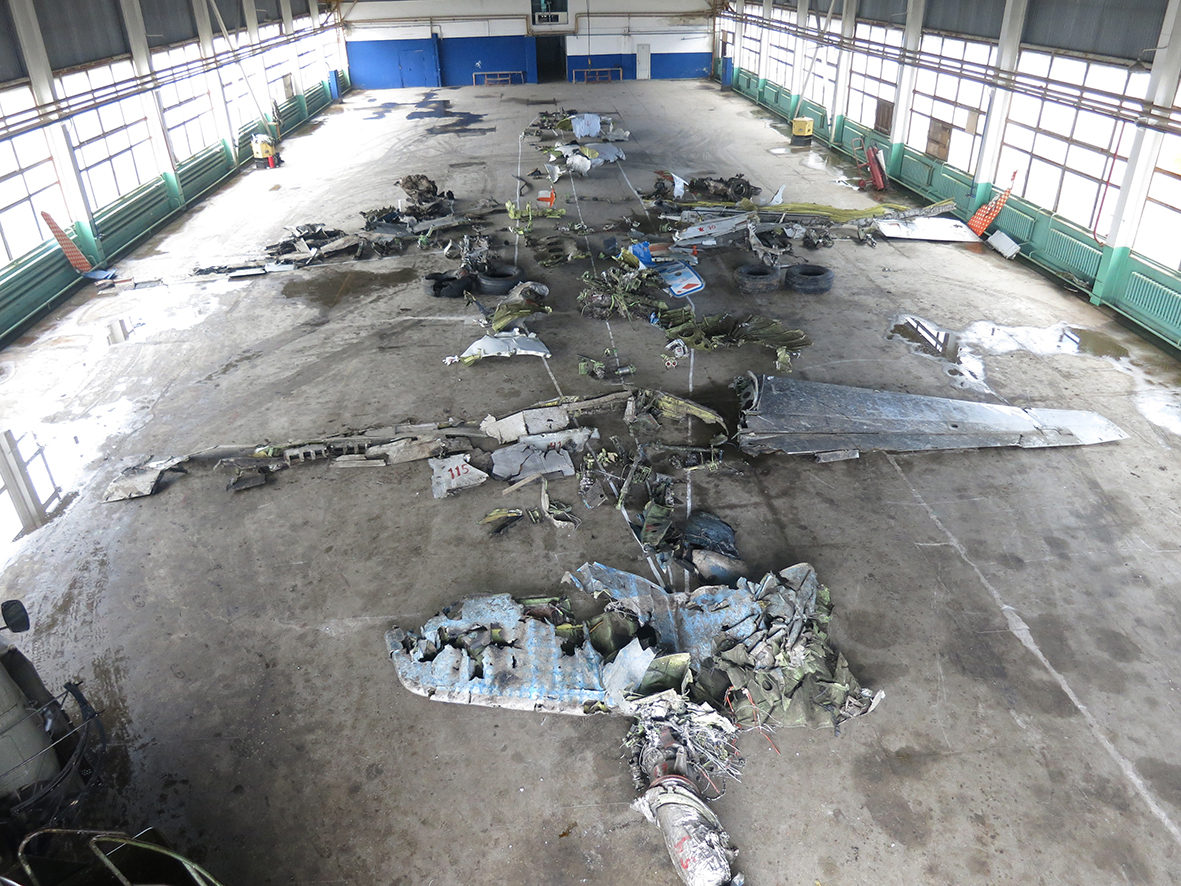 The remains of A6-FDN reassembled in a hangar for the investigation